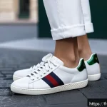 Home 19 구찌 에이스 스니커즈와 발렌시아가 트리플S 비교 - A sophisticated and minimalist streetwear scene featuring a person wearing sleek Gucci Ace sneakers ...